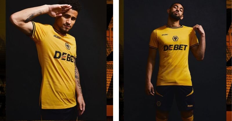 Wolves home kit in yellow, with centred badge and black detailing